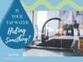 Kitchen sink with running water.