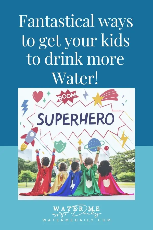 Kids dressed up like super heroes sitting on grass with arms up cheering